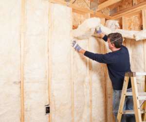 insulation being added to home to make it more energy-efficient