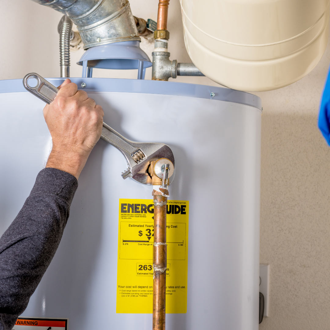 Hand tightening pipe connection with wrench on water heater