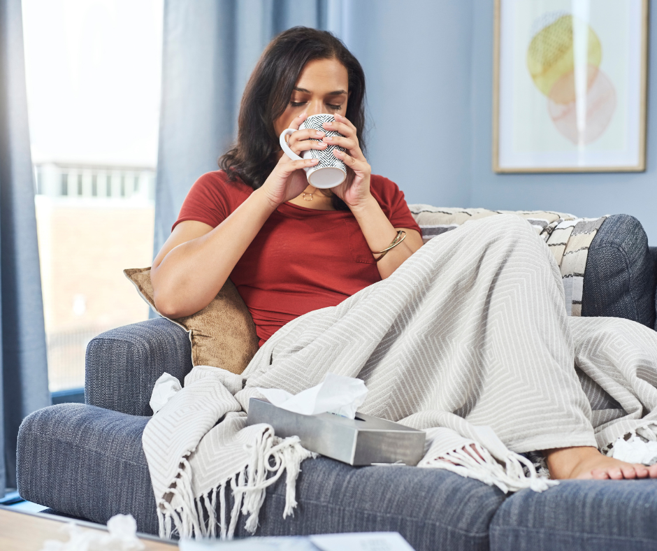 woman staying warm in home with Energy-Efficient upgrades
