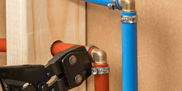 Pex plumbing pipe in wall of house. One of the types of plumbing used in remodeling