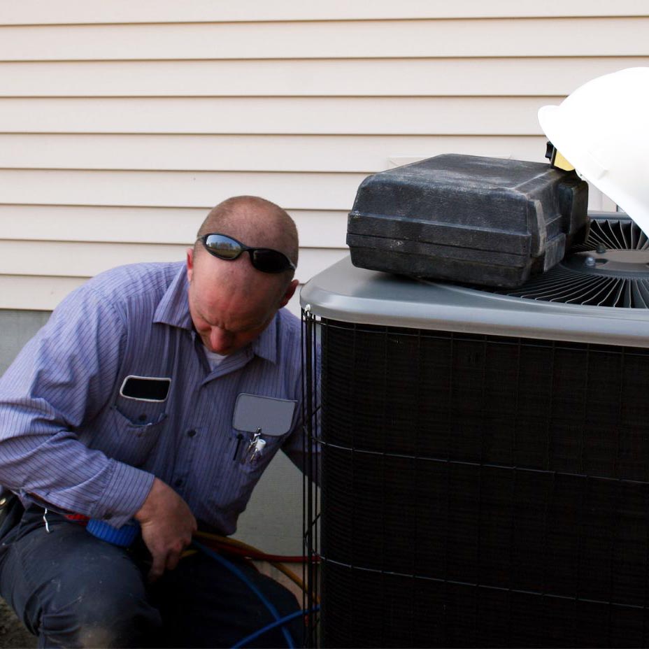 technician repairing ac that is not working
